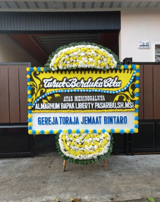 Papan Bunga Duka di Caruban